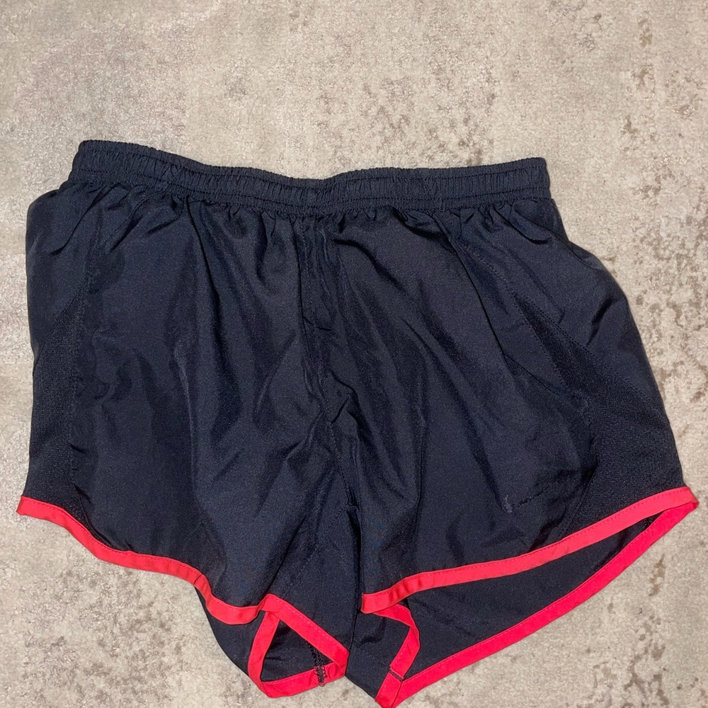 Black Nike shorts with red trim